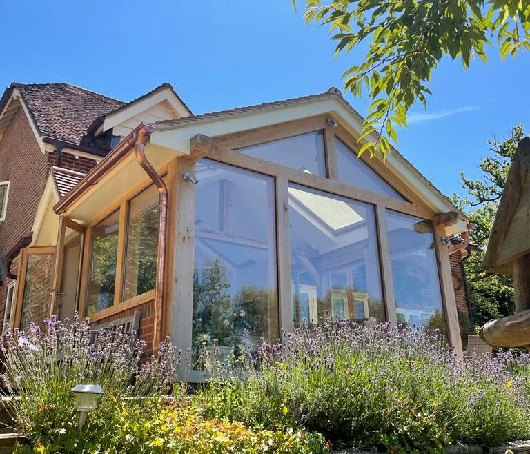 Oak frame extension Lymington by Brewer Design and Build