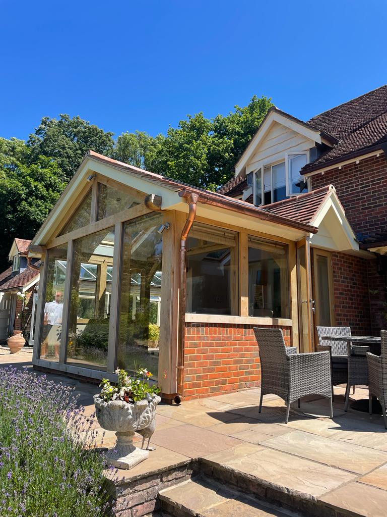 Oak frame extension Lymington by Brewer Design and Build